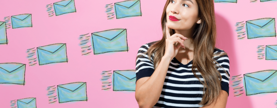 The image shows a small businesswoman thinking about email. In the article, we discuss the five little things that matter when creating an email to audiences.