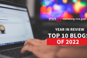 The image is a banner promoting the top 10 marketing blogs of 2022 from Marketing Nice Guys.